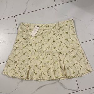 Anthropologie, En Saison skirt. Cream with a shimmery green embroidery. Size M.